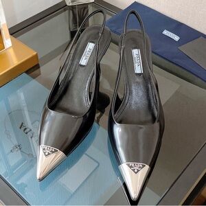 Prada Glossy Black Slingback Heels with Silver Tip